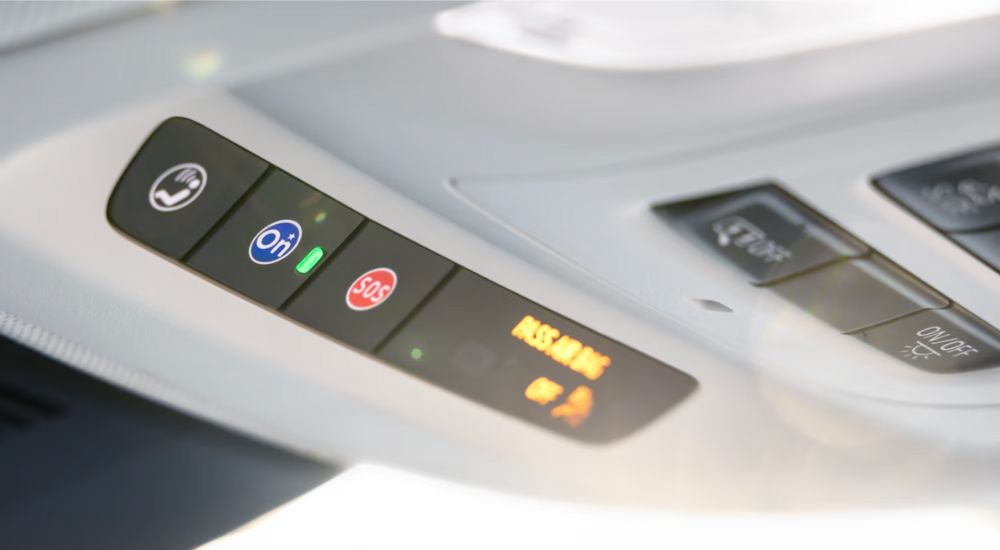 Close-up of the OnStar buttons in a 2024 Buick Envision.