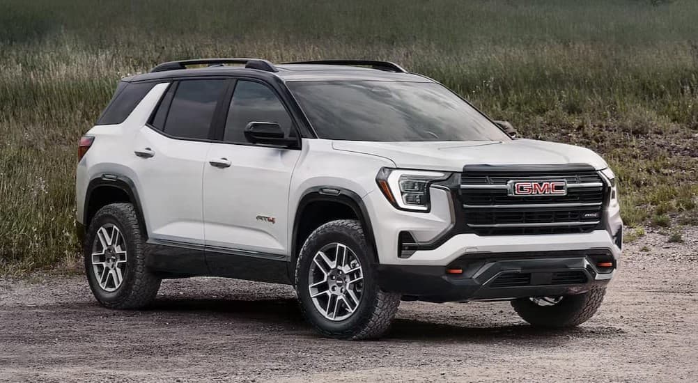 A white 2026 GMC Terrain AT4 parked offroad.