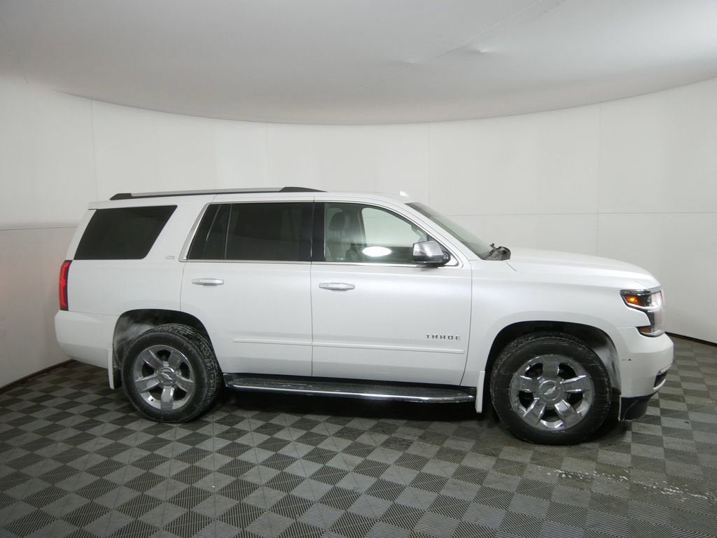 Used 2016 Chevrolet Tahoe LTZ with VIN 1GNSKCKC7GR452942 for sale in Golden Valley, Minnesota