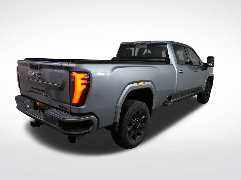 Used 2024 GMC Sierra 3500HD AT4 with VIN 1GT49VEY6RF244524 for sale in Golden Valley, Minnesota