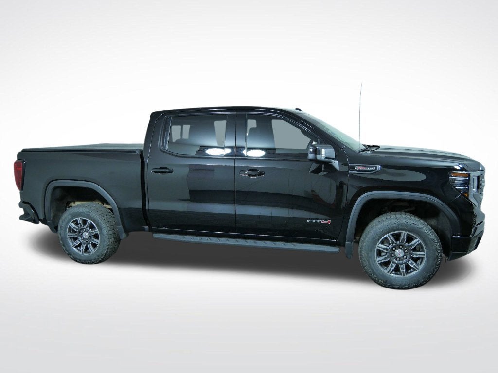 Used 2024 GMC Sierra 1500 AT4 with VIN 1GTUUEEL9RZ149604 for sale in Golden Valley, Minnesota