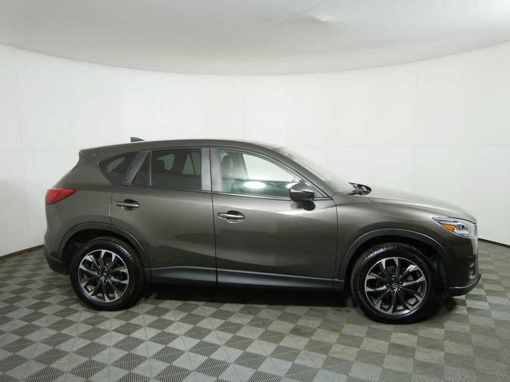 Used 2016 Mazda CX-5 Grand Touring with VIN JM3KE4DY1G0748761 for sale in Golden Valley, Minnesota