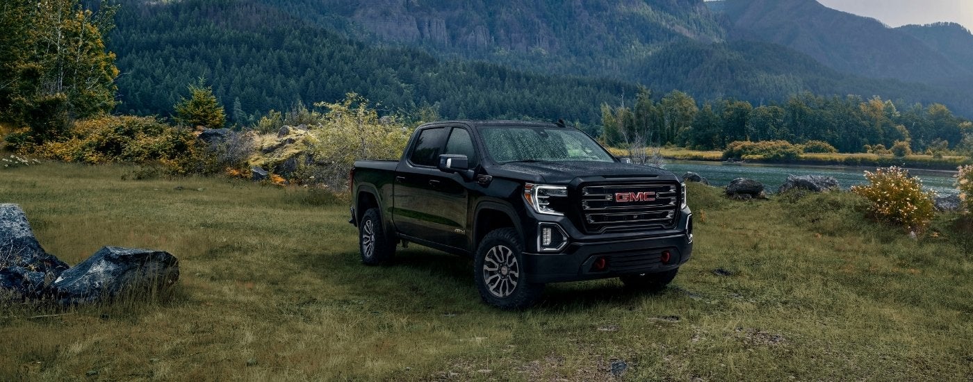 Black 2019 GMC Sierra 1500 AT4 parked off-road